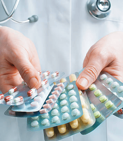 Doctor holding medicines 